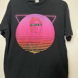 Vintage black shirt with “Forgive Me” graphic in good condition.